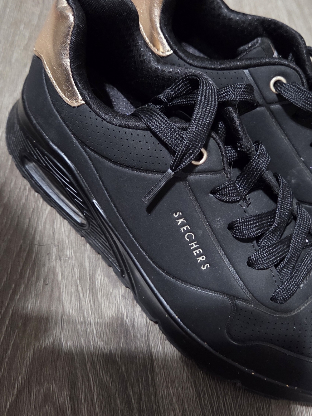 Skechers Black Sneakers with Metallic Rose Gold Accents